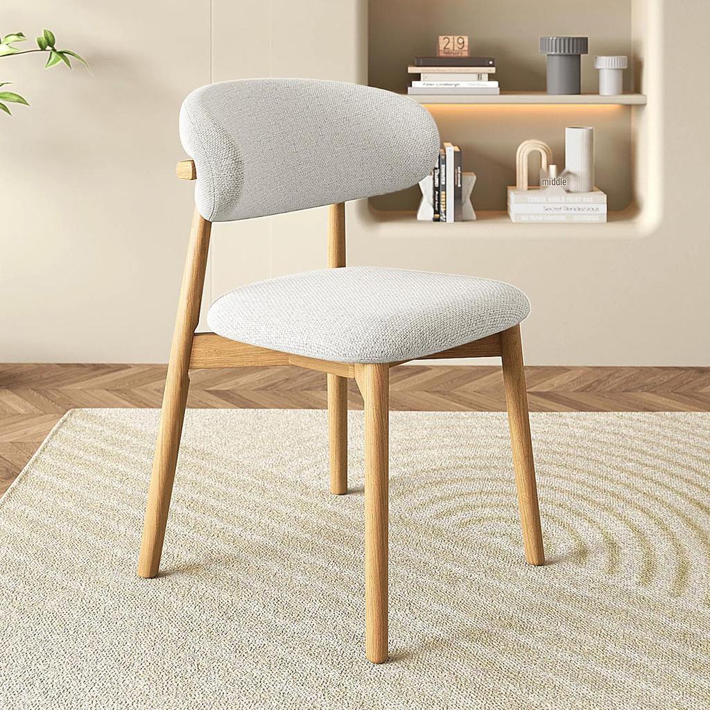 Nordic Modern Minimalist Solid Wood Dining Chair with Soft Pack Backrest - Comfortable Light Luxury Ram's Horn Design for Home, Restaurant, and Hotel.