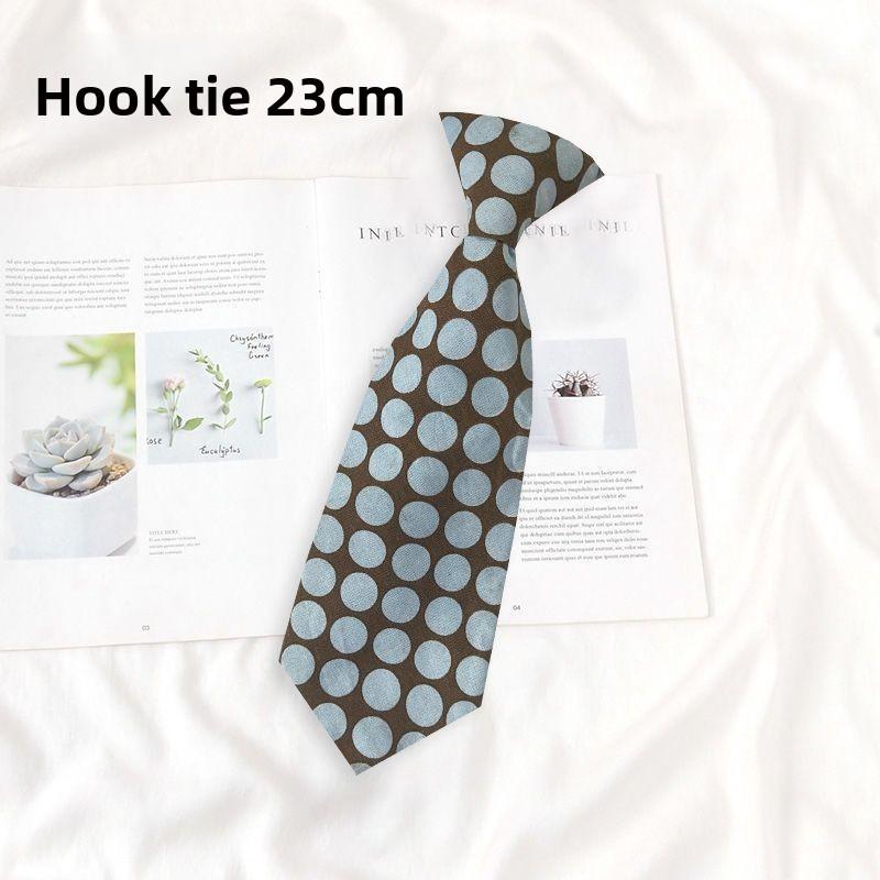 Barnslips med randigt märkesmönster för skoluniformer och fritidskläder