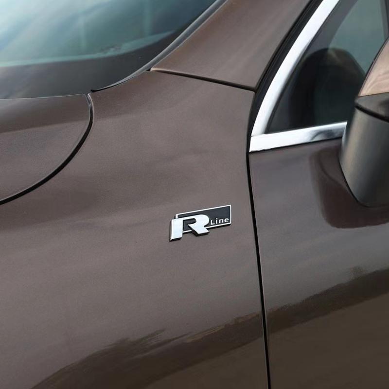 AGLNX1 1Pcs ABS Metal Logo Car Front Grille Badge Decoration Sticker Auto Accessories For VW RLine R Golf Amarok T5 Teramont ID3 Tiguan