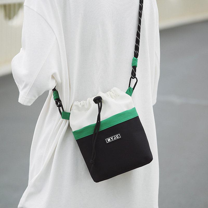 Korean niche color-blocking outdoor sports crossbody bag2026New simple casual mobile phe bag, lightweight drawstring pouch