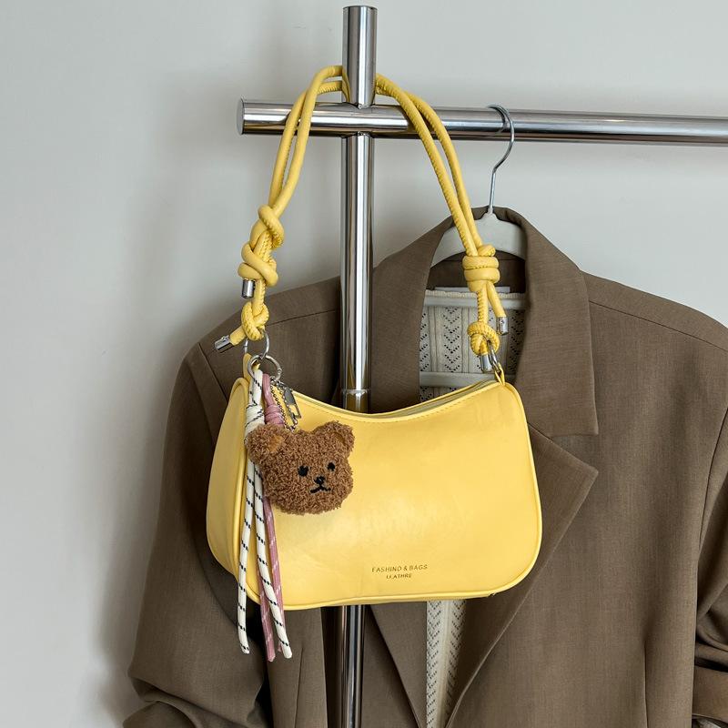 Solid color niche design simple and fashionable dumpling bag new versatile shoulder armpit messenger bag