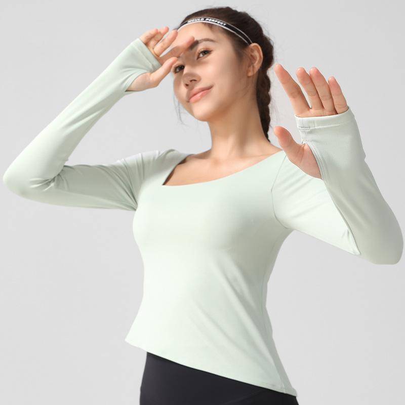Yoga clothes new long-sleeved nude high elastic sports t-shirt women's one-piece fixed cup high-end fitness clothes spring and summer