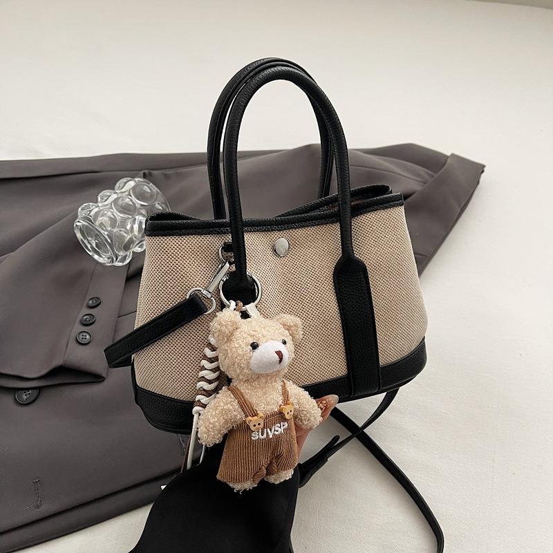 Summer new fashion contrast large-capacity hand-held bucket bag women's simple casual commuter shoulder body bag