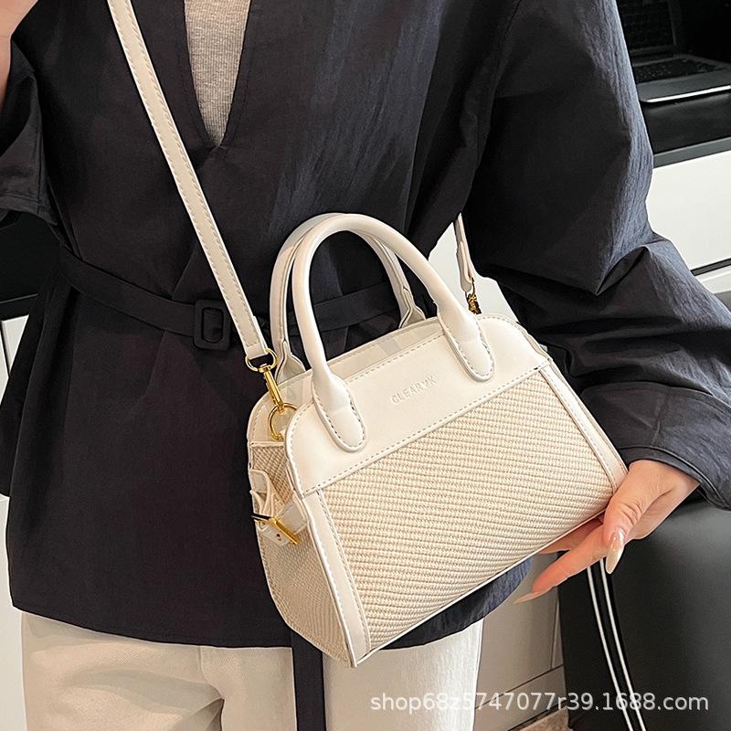 Korean casual handbag women's 2025 new fashionable foreign texture messenger bag splicing niche design saddle bag