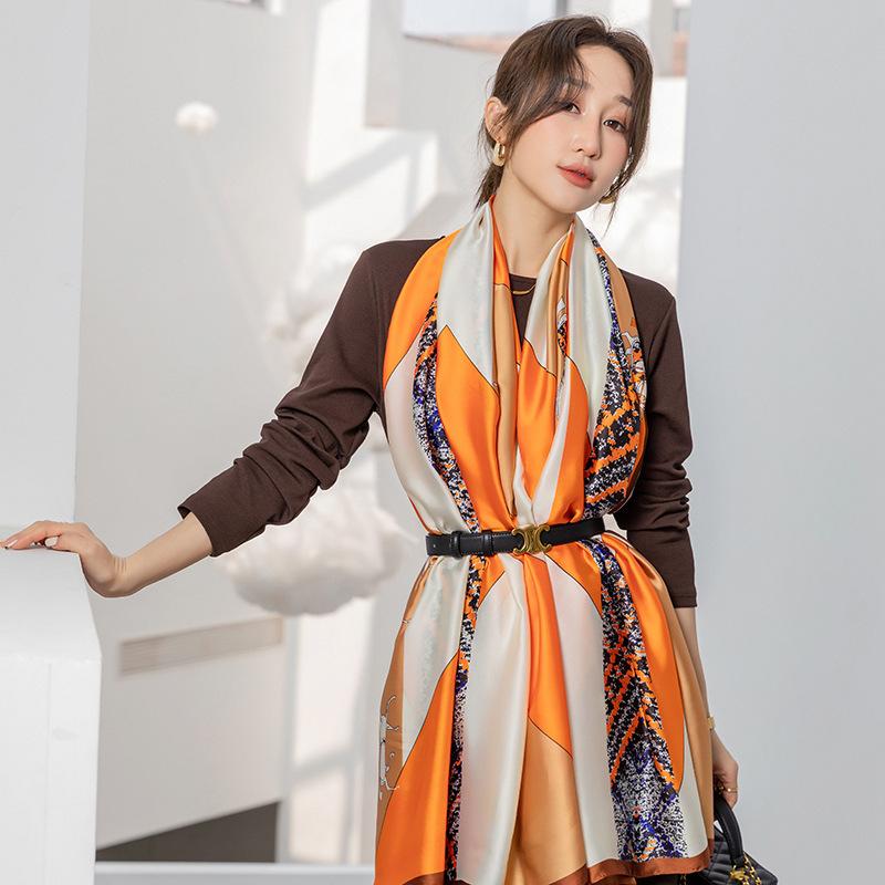 Wczesną wiosną nowy prosty kolorowy geometryczny blok kolorów długi jedwabny szal koreańska wersja damskiego temperamentu podróż długi szal