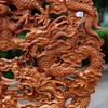 Nine Dragons Peach Wood Pendant: Hand-Carved Hanging Ornament for Home Entrance or Living Room Decor.
