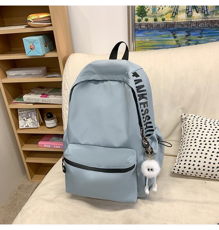 School bag solid color letter fashion backpack Korean version college student lightweight school bag outdoor travel large capacity backpack