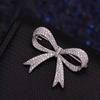 Elegant Bowknot Water Drop Brooches Pin For Girl Bridal Shiny Metal Small Brooch Pin Lapel Pins Fixed Anti Button Clothing
