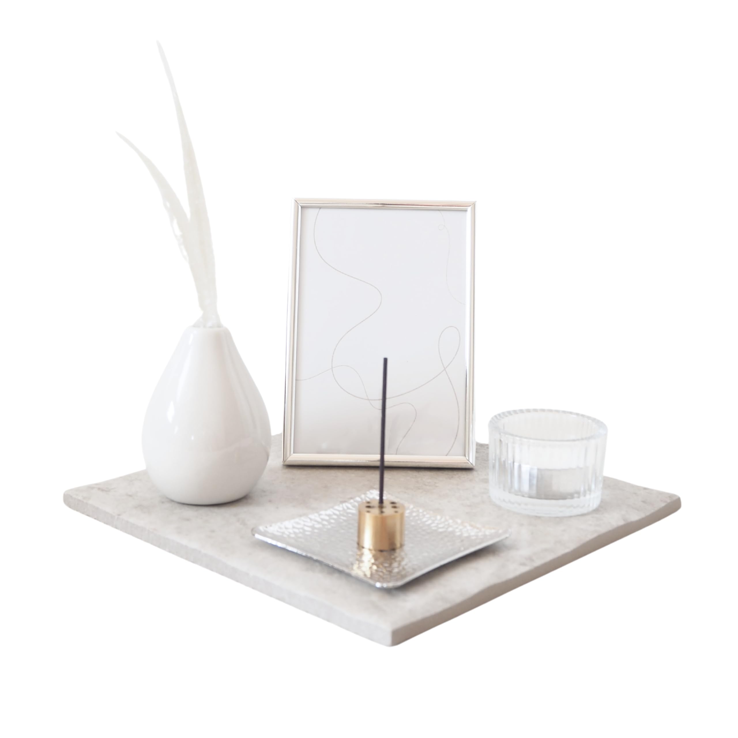 

A small, modern, and compact memorial altar set for keeping pets and their remains close at hand. Includes an incense burner, flower vase, candle hold