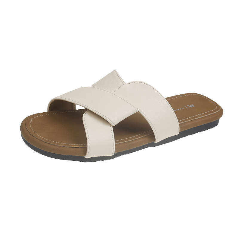 Retro niche flat-bottomed slippers women's summer 2025 new French soft-soled outer wear ins beach cross sandals