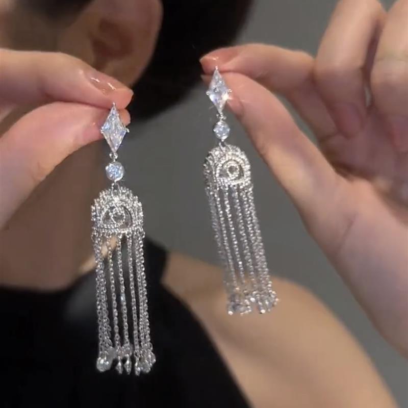 Silver Needle Cross-Border Tassel Earrings: Women's Versatile, Stylish Studs with a Unique, Trendy Design.