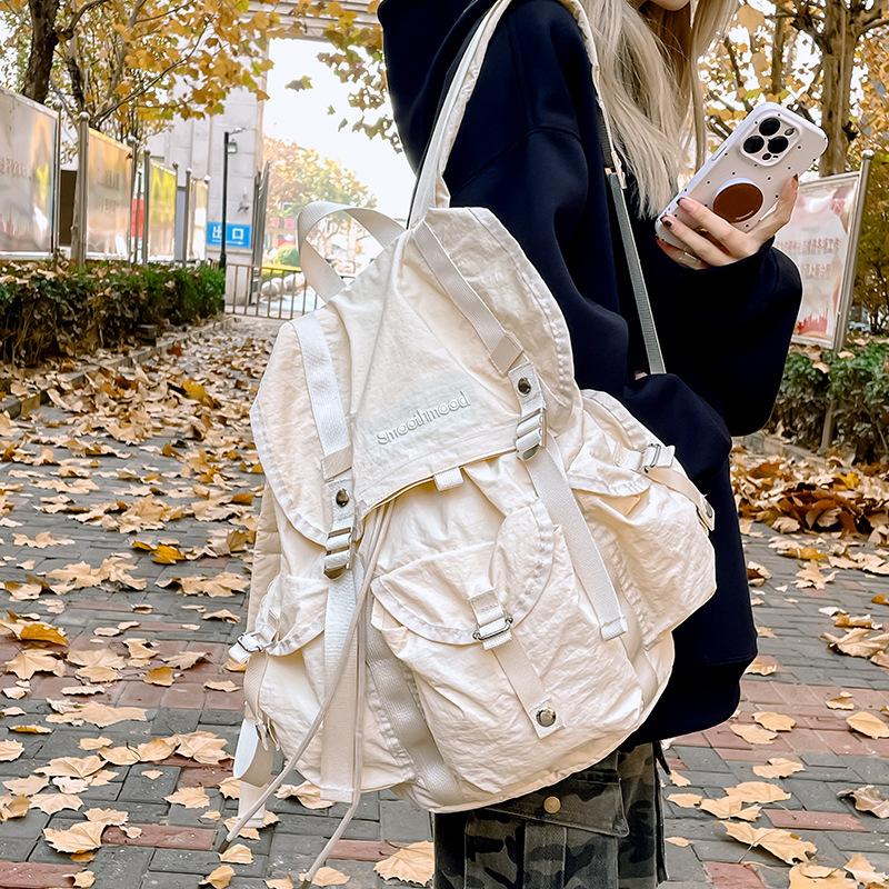Schoolbag Casual Large Capacity Multi-Pocket Backpack Male Korean Version Niche Premium Travel Backpack Light Commuter Schoolbag Female