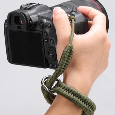 Rychloupínací popruh na ruku pro fotoaparát, nastavitelný nylonový paracordový pletený popruh na ruku pro zabezpečení DSLR bezzrcadlovky