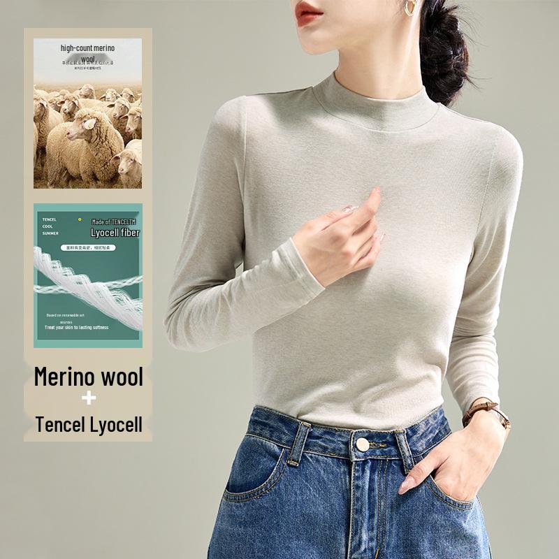 

Женский черный топ-базовый слой с длинным рукавом, облегающего кроя, из тенселя и мериносовой шерсти - полувысокий воротник, коллекция Осень/Зима 2025. Large