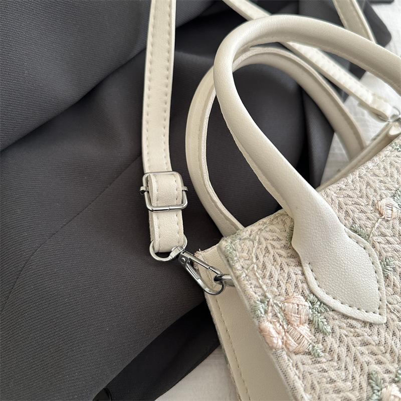 Niche Design Fashion Women's Bag 2025 New Straw Woven Portable High-end Commuter Shoulder Messenger Small Square Bag