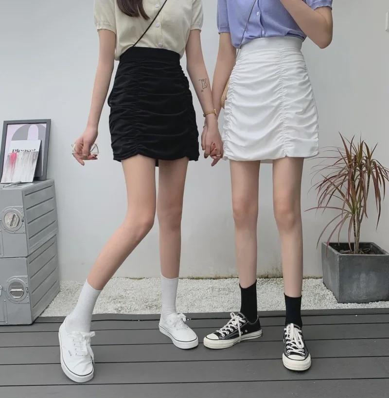 2025 Letní dámská plisovaná mini sukně - Trendy jednobarevná hot girl styl