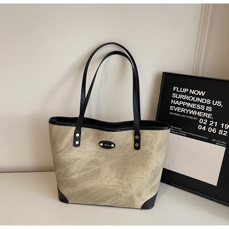 Large-capacity bag women's autumn and winter versatile 2025 new fashion casual shoulder bag texture class commuter bag