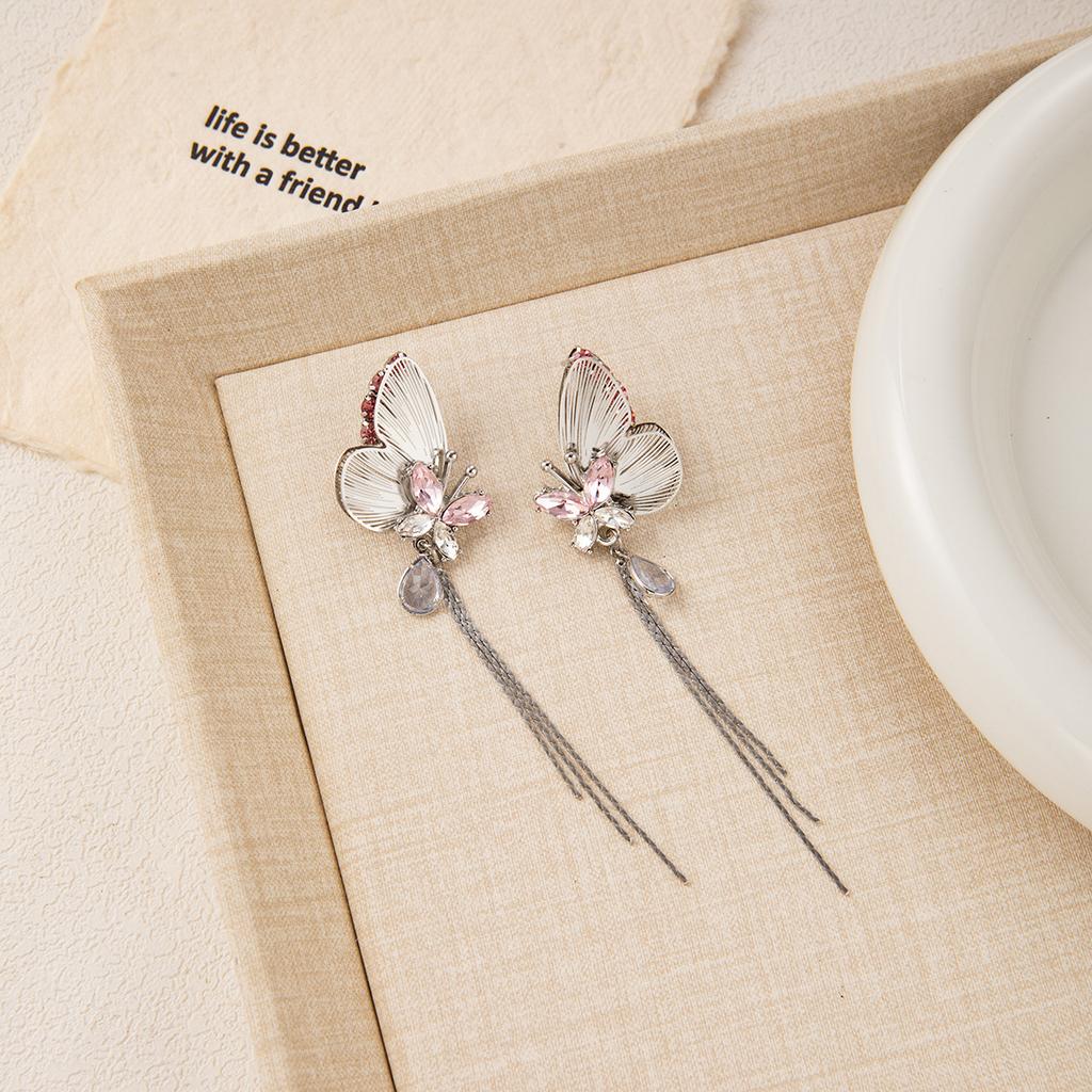 Silver needle super fairy tassel shining pink three-dimensional butterfly stud earrings heavy industry light luxury high sense unique niche earrings