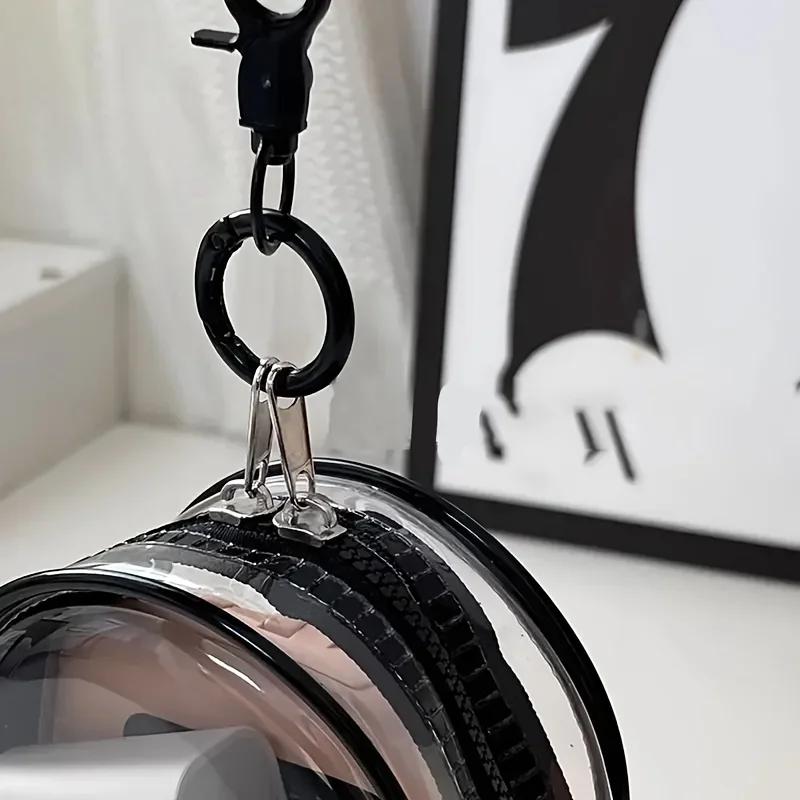 Portable transparent zipper mini storage bag, compact organization for earphones and chargers, with a practical keyring