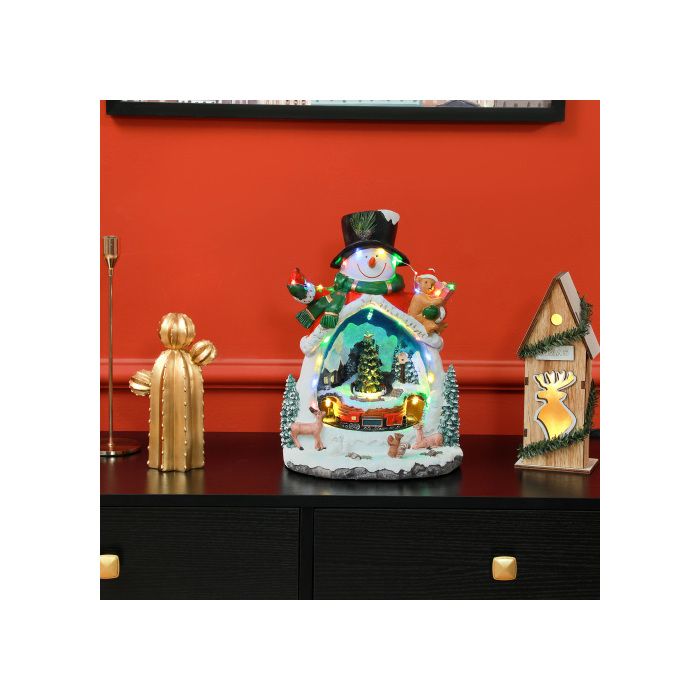 Village de Noël HOMCOM Cette ville miniature festive est dotée de lumières LED, créant un décor hivernal féérique et coloré.