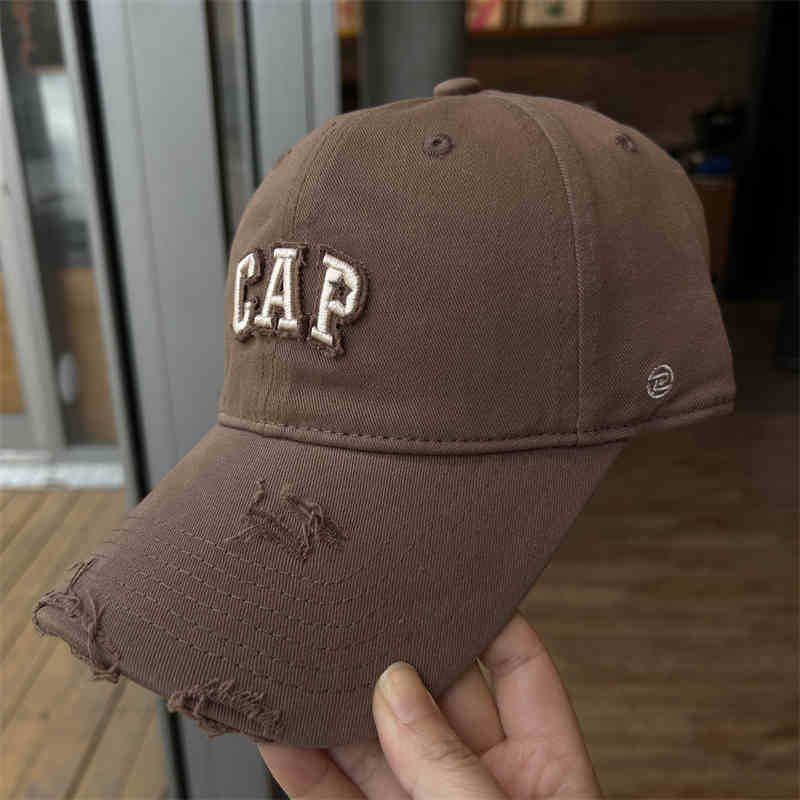 Koreanische Version von alter zerrissener Sonne sichtbare Baseballkappe für Damen Sommer Herren und Damen All-Match Buchstabenstickerei Mode Hip Hop Baseballkappe