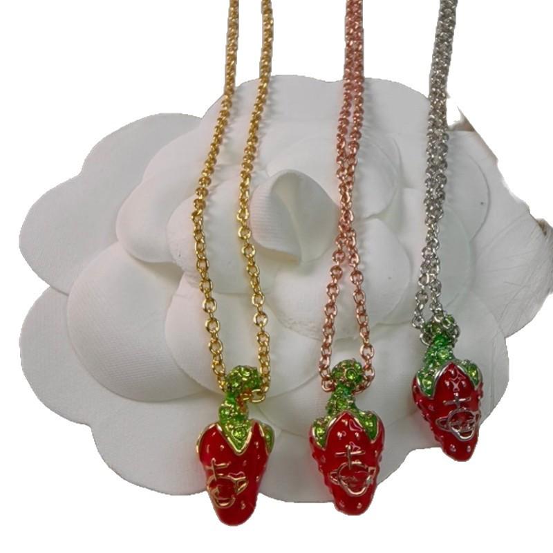 Western Empress Erdbeerkette: Niedlicher roter Saturn-Anhänger Choker, Weihnachts-Stil