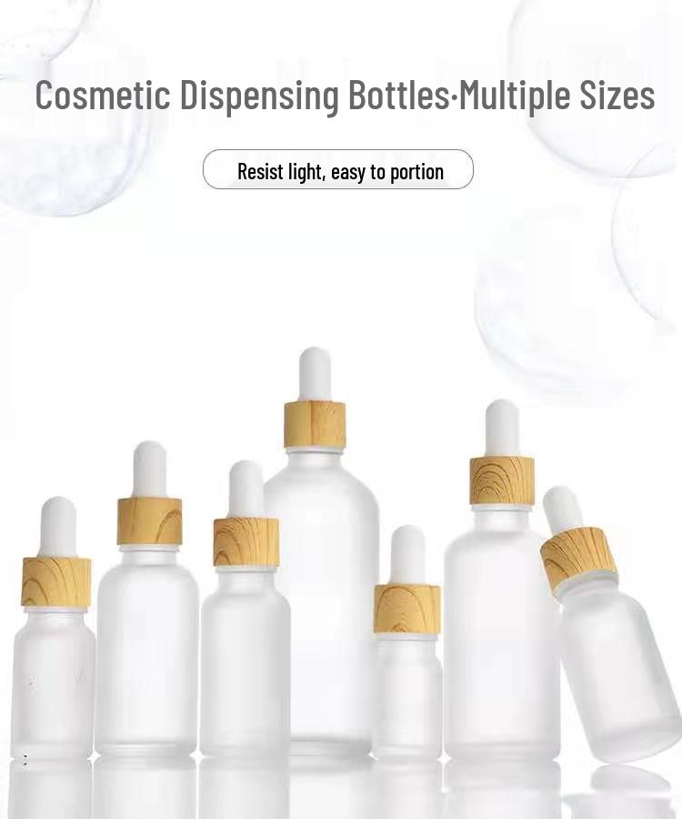 Mattschwarze Frosted Glass Flasche für ätherische Öle mit Holzmaserungsring und Tropfer/Sprühaufsatz