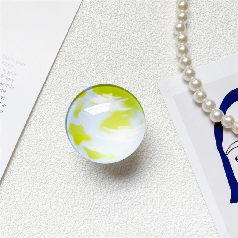 

Creative Laser Starry Sky Glass Crystal Phone Stand Personalized Air Cushion Telescopic Lazy Portable Anti Drop White Background Bracket