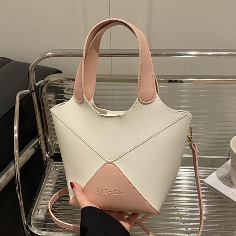 

Large-capacity hand-carried bucket bag women s 2025 new versatile fashion trend shoulder bag Korean version niche underarm bag розовый