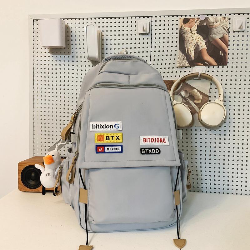 

New schoolbag men ins trendy cool college student couple backpack retro contrasting color middle school student large-capacity backpack Single pack сірий колір