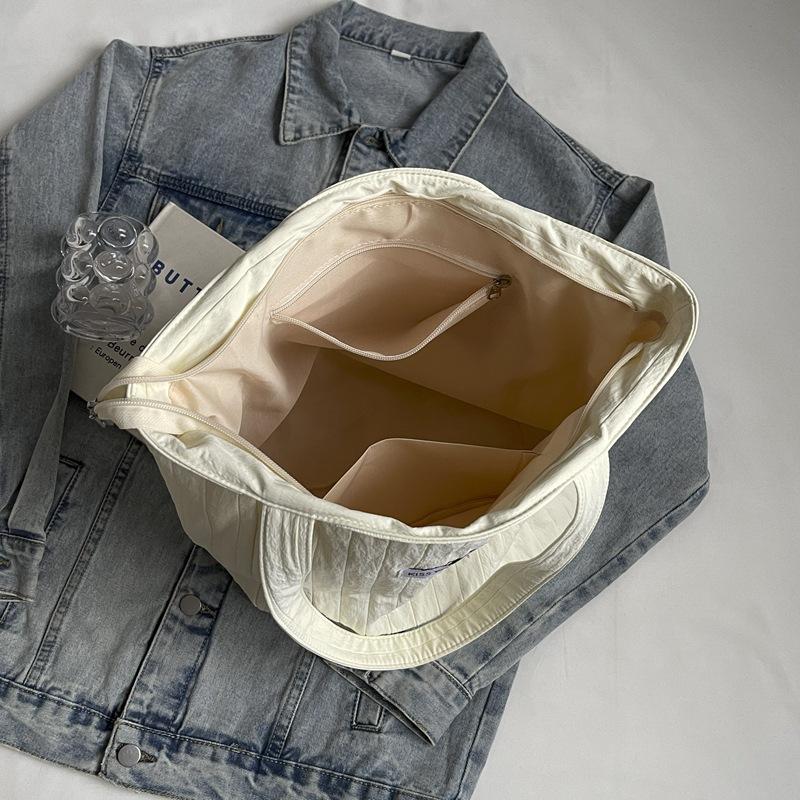 Large capacity tote bag women's new summer striped sewing line simple shoulder bag leisure bag