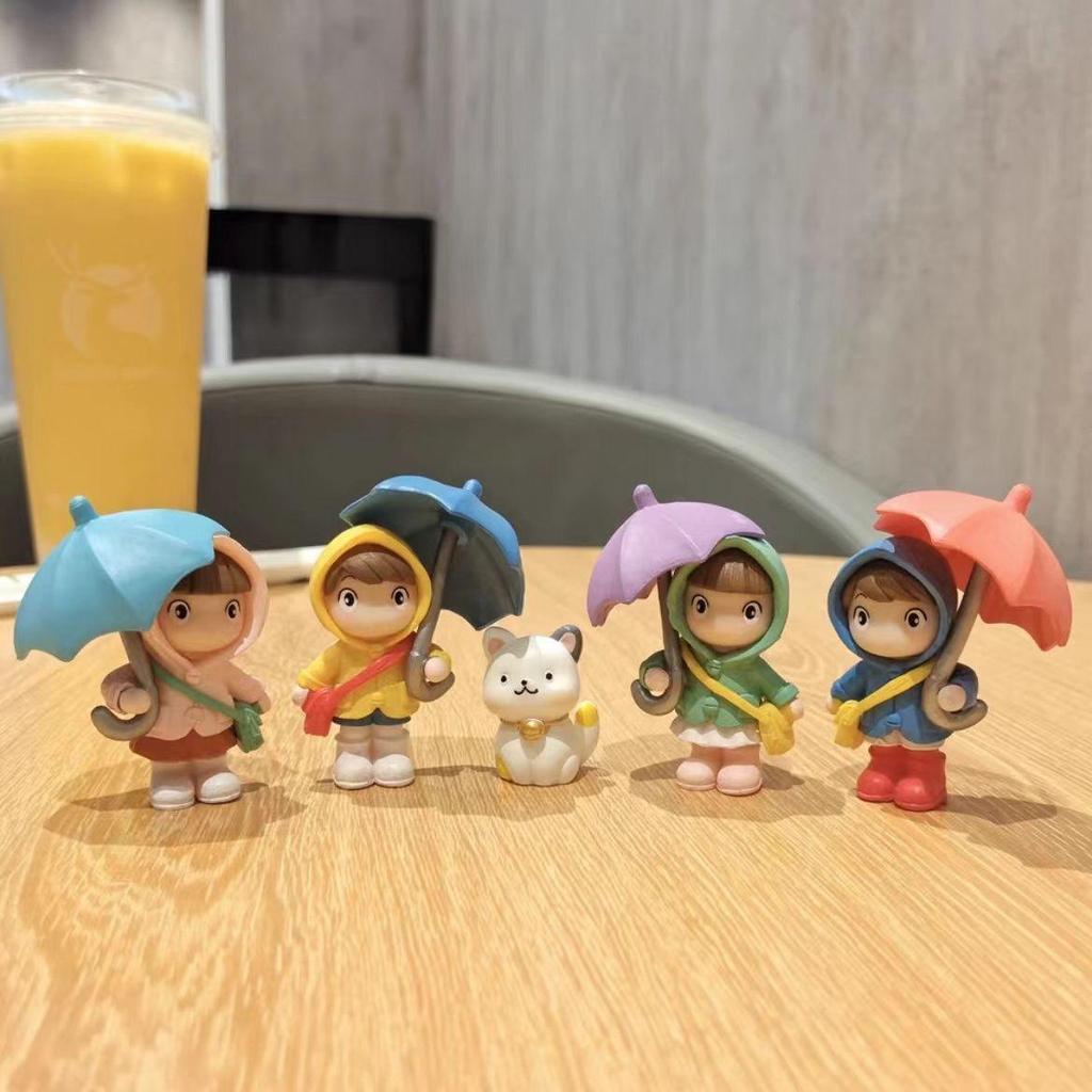 Cartoon Character Desk Ornament: Cute Umbrella-Holding Figure for Creative Office Decor
