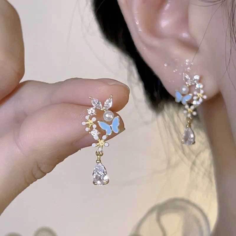 Koreanischer Stil Nicht-Piercing Ohrclip mit langem Quaste, Perlmutt Schmetterlings Design für Damen - High-End, Coole Mode.