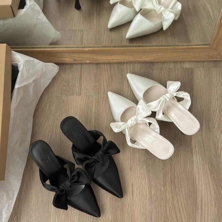 Summer women's 2025 new bow pointed head bag head sandals go out niche high value thin heel heightening slippers