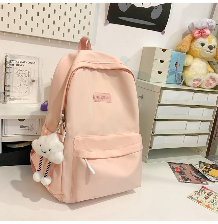 Schoolbag Japanese simple backpack large capacity high sense casual backpack male multi-function solid color female college student schoolbag tide