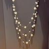Korean Fashion Pearl Necklace: Elegant Long Chain for Women, Ideal for Sweaters, Versatile for Autumn and Winter.