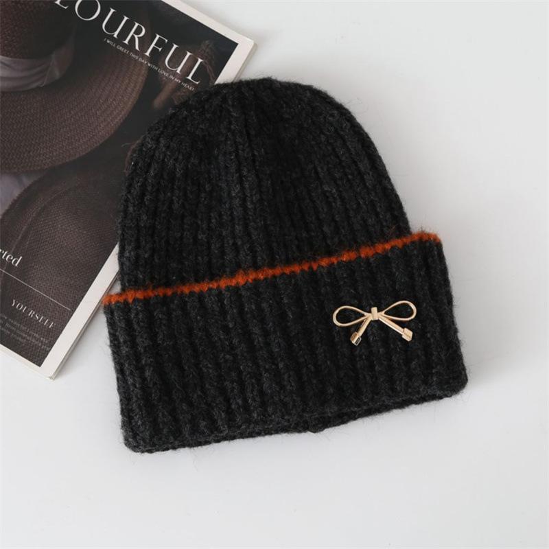 New autumn and winter women's bow knitted hat big head circumference thickened warm ear protector wool hat shows small face cold hat