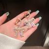 Celebrity bow pearl fringed earrings women's light luxury high-end earrings fashionable exquisite versatile earrings