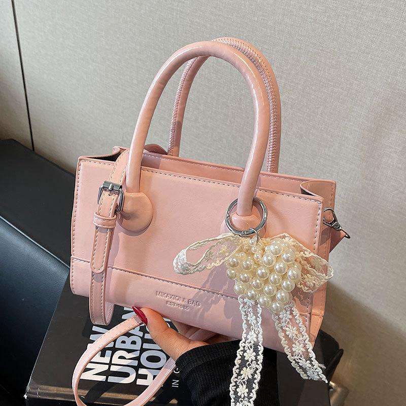 Wholesale Popular Niche Simple Temperament High Sense Portable Small Square Bag Women's Fashion Versatile Work Commuter Messenger Bag