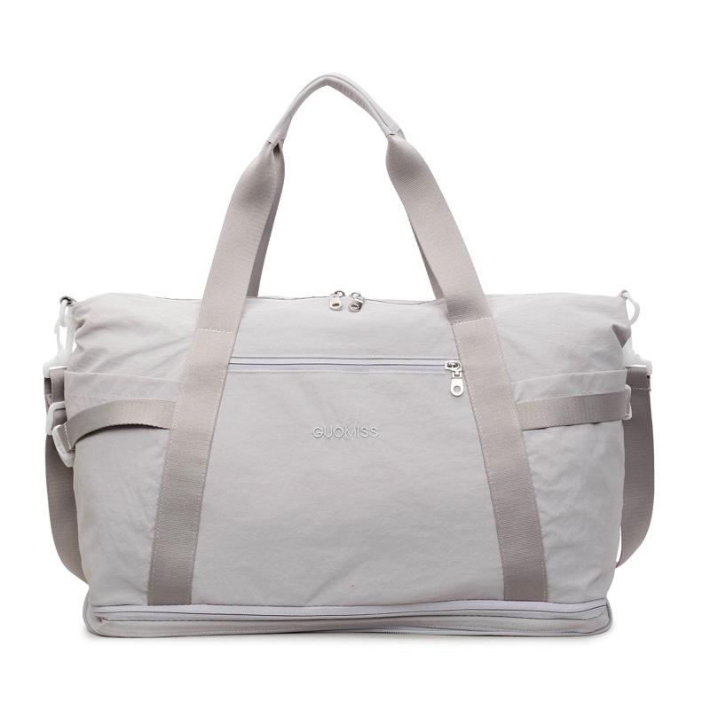 Foldable large-capacity crossbody travel bag for women, suitable for short trips, business trips, boarding, tourism, and gym use