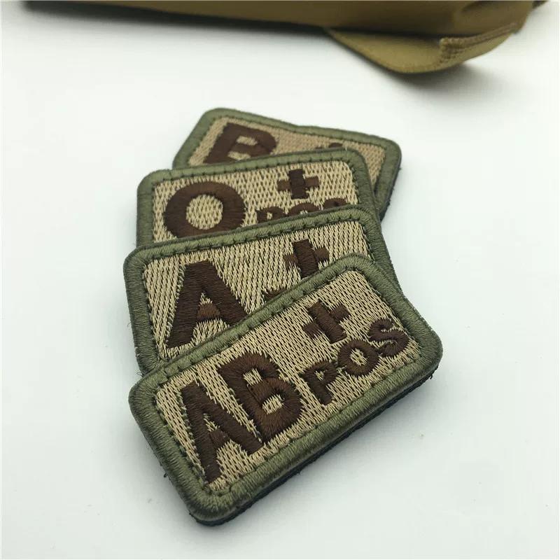 Taktisches Blutgruppen-Siegel Identifikations-Siegel Stickerei Klettverschluss-Abzeichen Armband Typ A Typ B Typ AB Typ O + POS Militär-Fan