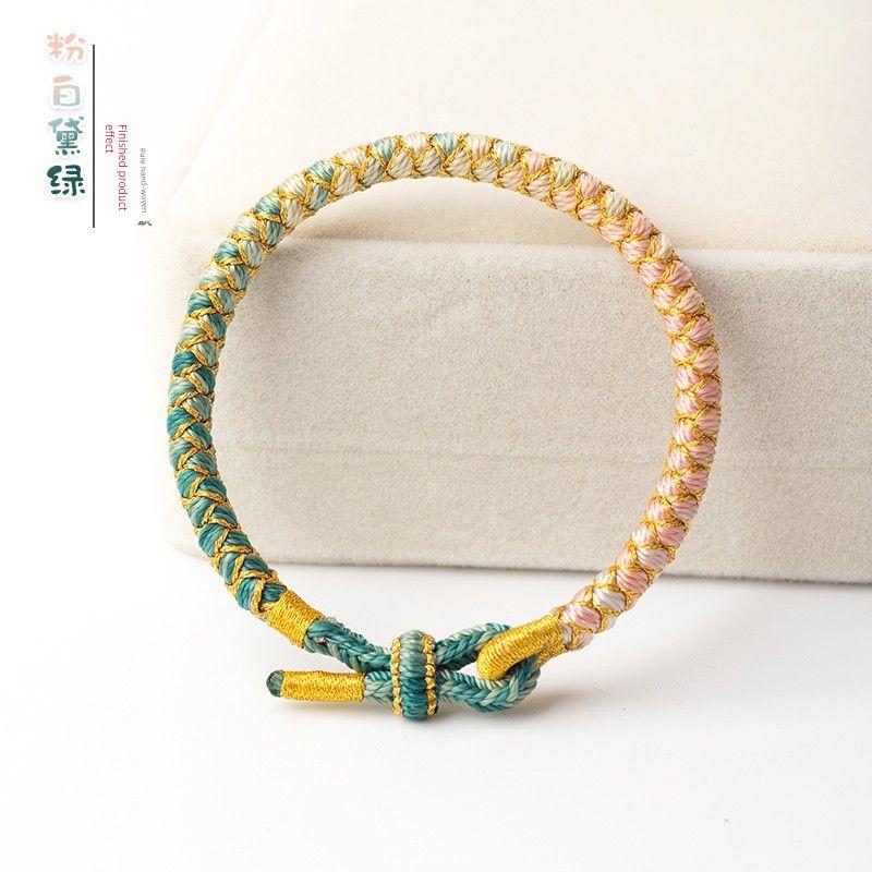 

Градиентный ремешок для переноски с чешуей дракона, секционно окрашенная прядь, самотканый материал, пакет для материала, плетеная вручную веревка для браслета «сделай сам», ювелирное изделие с безопасной застежкой White and Dai Green Dragon Scale Hand Ro