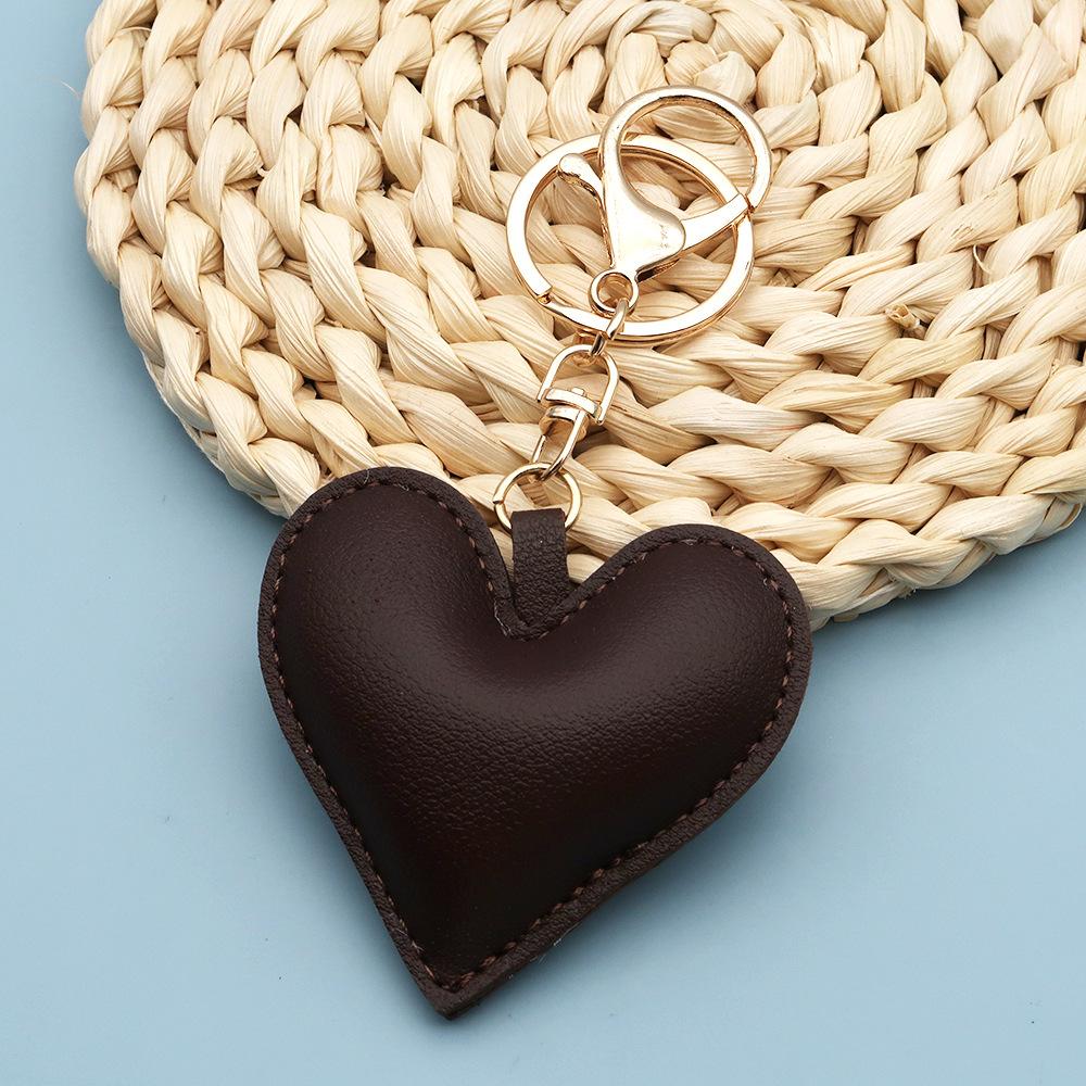 Spot wholesale PU simple peach heart bag pendant Xiaohongshu explosive love couple pendant keychain bag lanyard