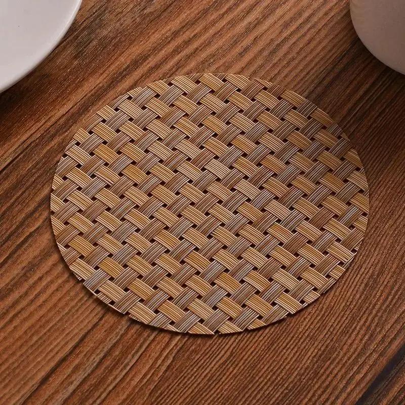 

1 шт. Плетеный ПВХ костер Ресторан Подставка под чашку Изолированная подкладка Водонепроницаемая Нескользящий коврик для стола Предметы домашнего обихода