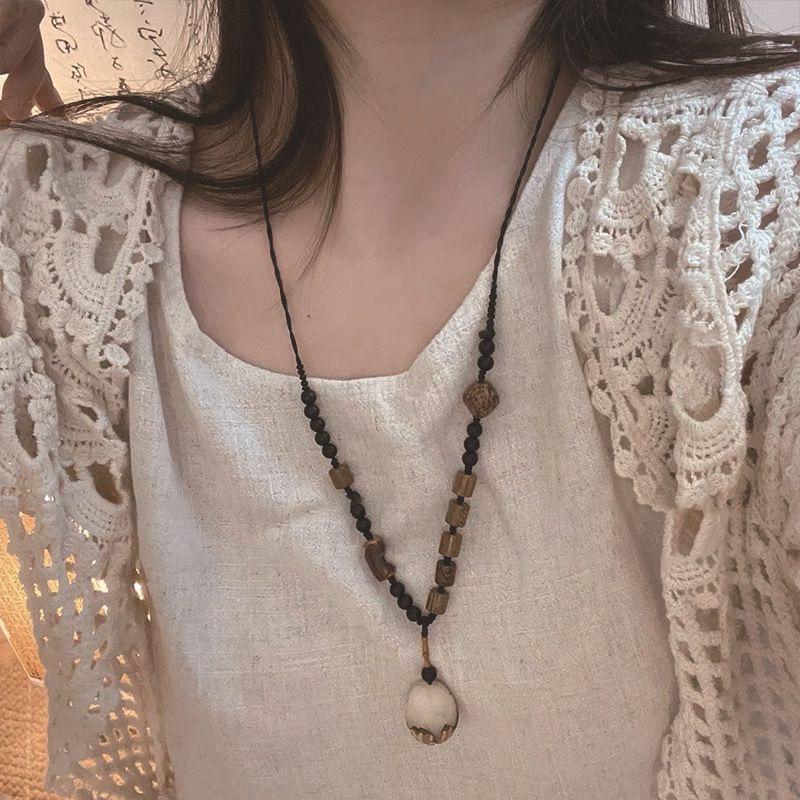 Bohemian Ethnic Style Long Bow Metal Necklace with Vintage Distressed Pendant (2025)