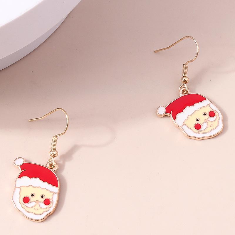 Weihnachtselch & Weihnachtsmann Schneeflocken-Ohrringe mit Persönlichkeit