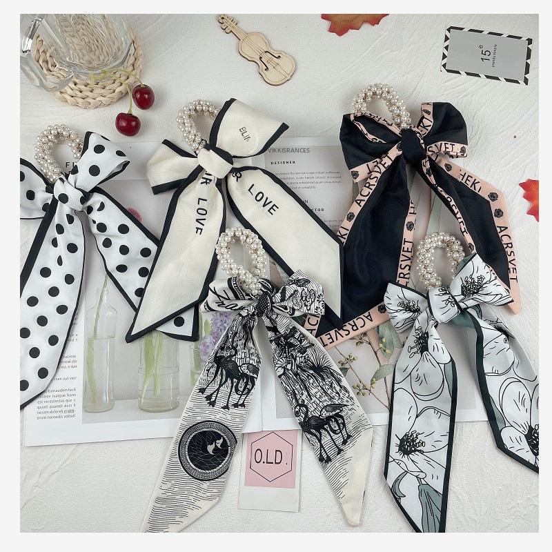 Panglică cu perle pentru păr – accesoriu elegant și elastic