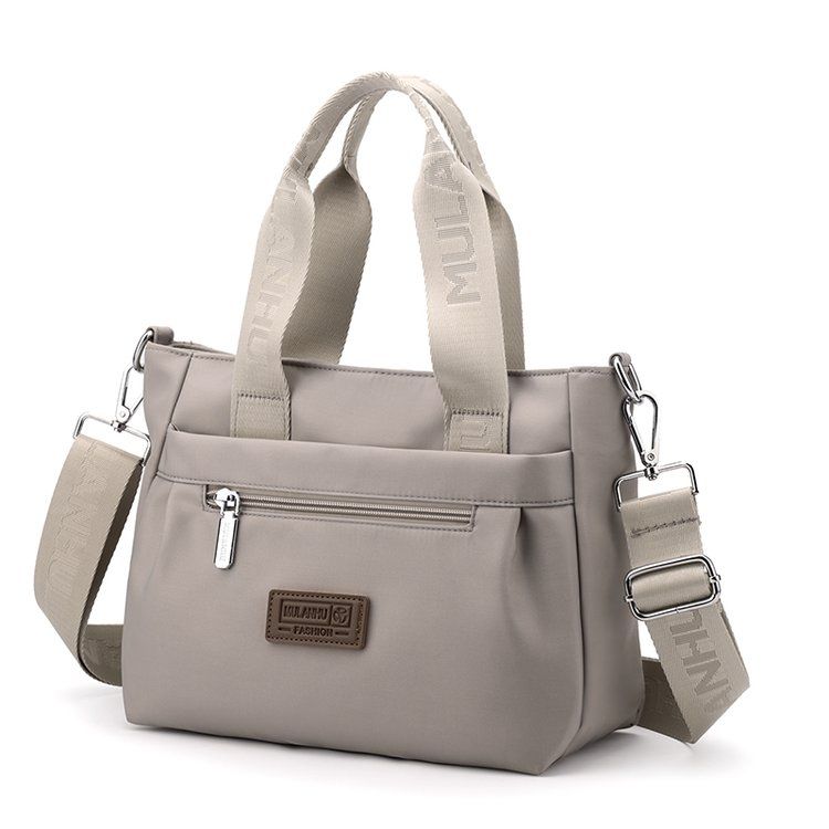 Nieuwe Dames Schoudertas Crossbodytas Gemaakt van Nylon Canvas Grote Capaciteit Lichtgewicht Handtas Meerlaagse Draagtas