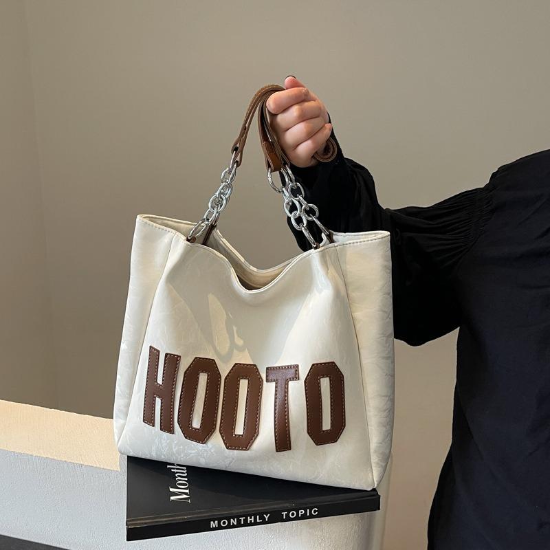 College students take classes, shoulder spring and summer bags, women's large-capacity new high-end textured commuter portable tote bags