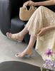 2025 summer thin strap metal decorative open-toed women's shoes fashionable commuting solid color medium heel sandals simple high heels